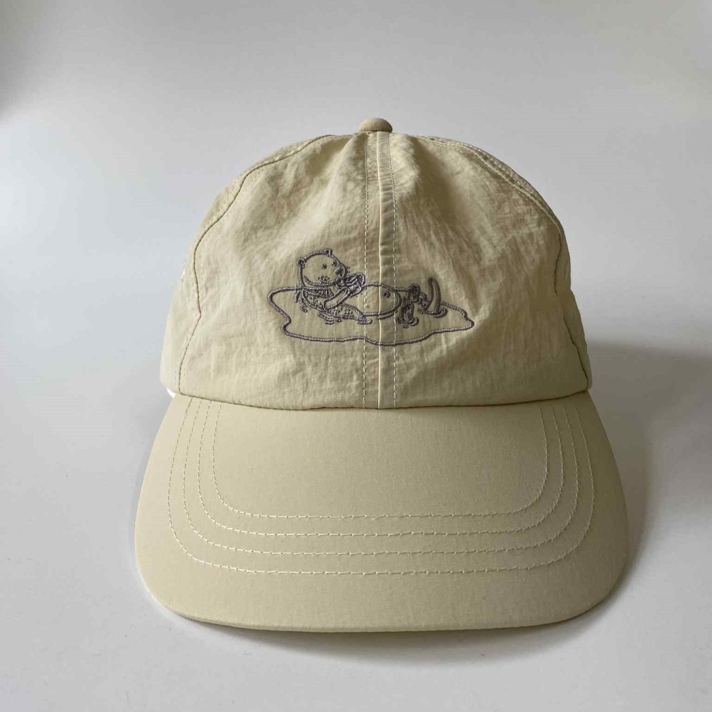 Underline Otter Floating Embroidery Nylon Cap