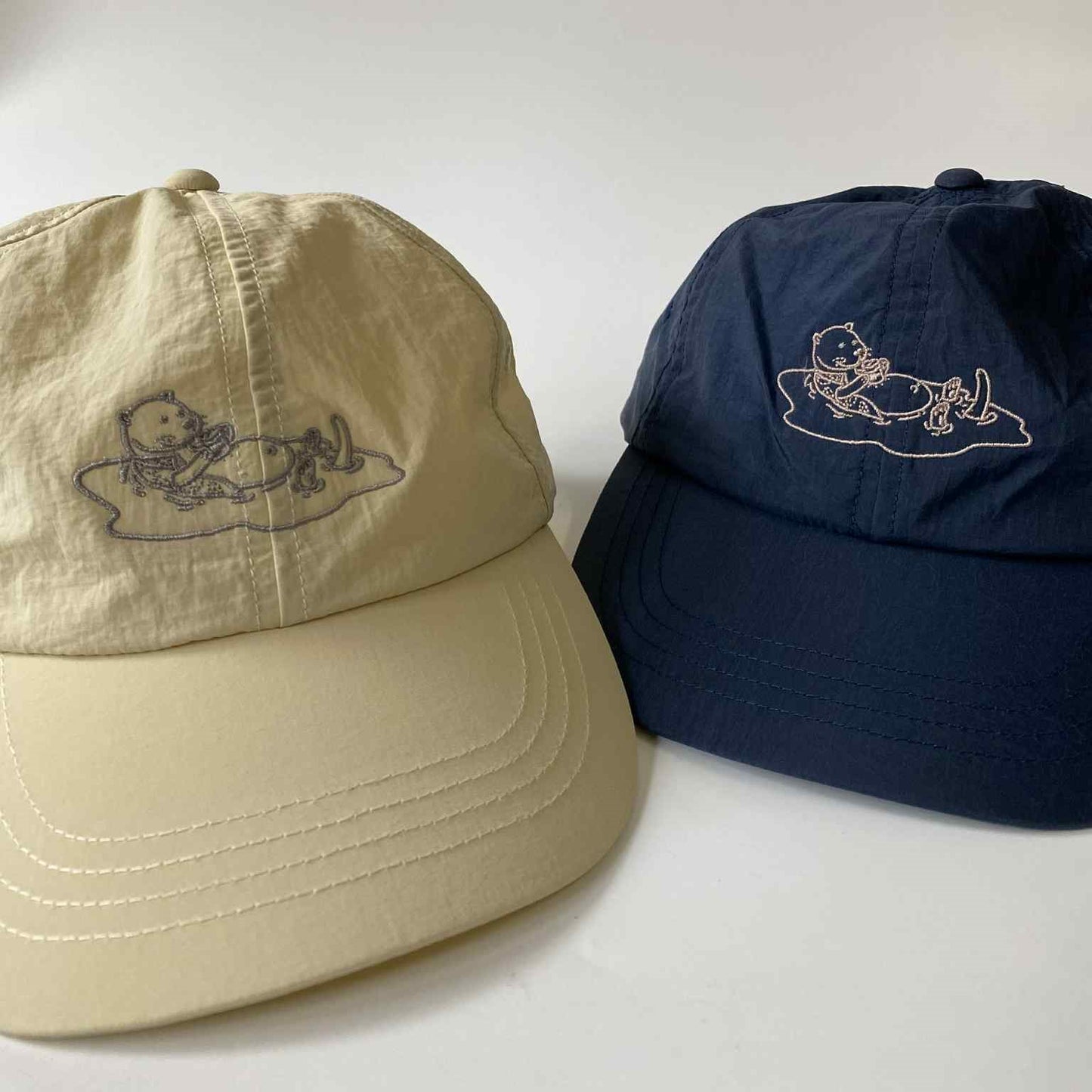 Underline Otter Floating Embroidery Nylon Cap