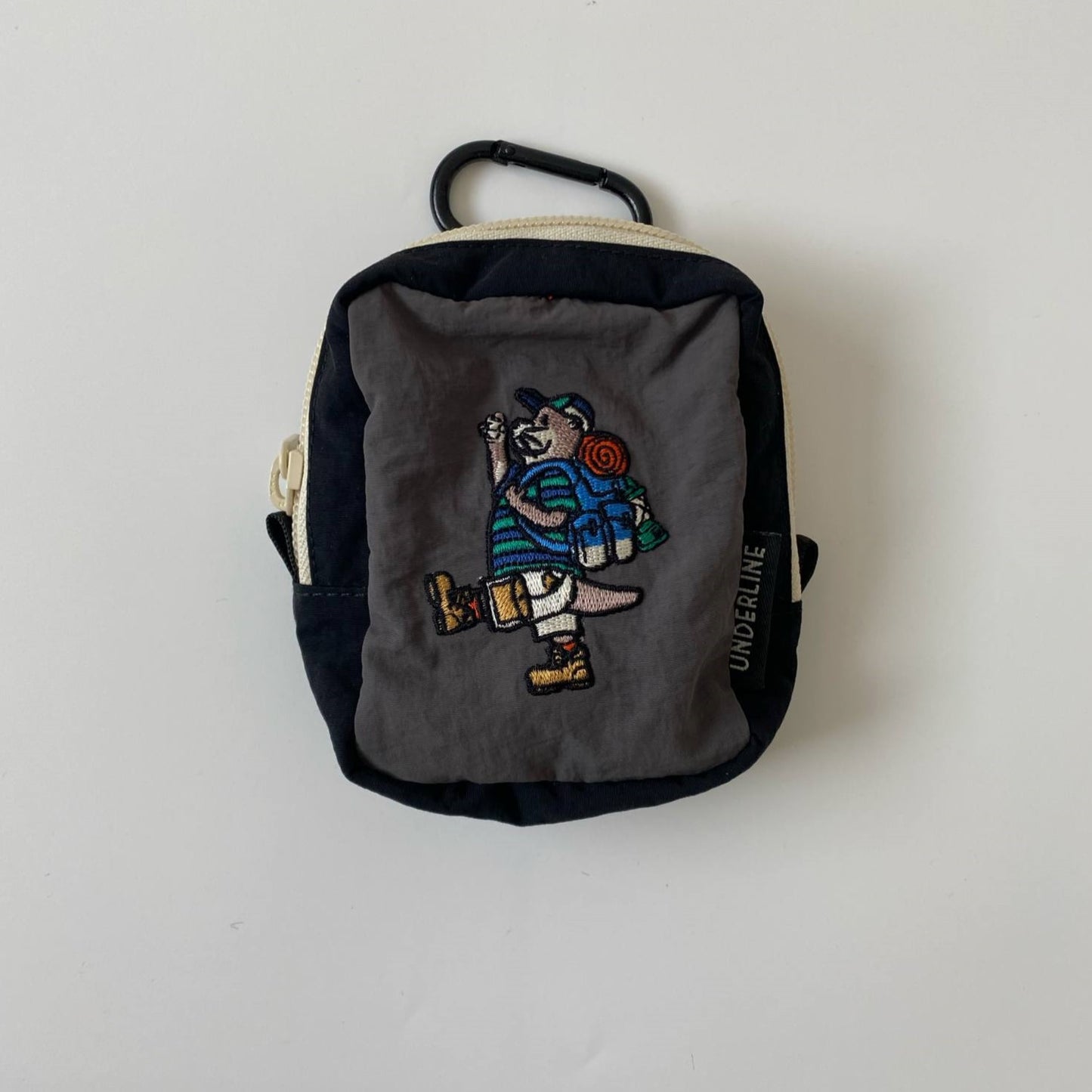 Underline Embroidery Pocket Bag