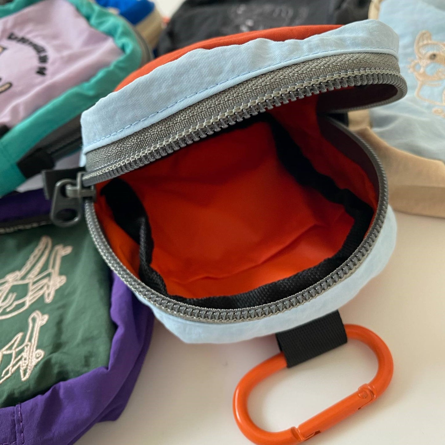 Underline Embroidery Pocket Bag