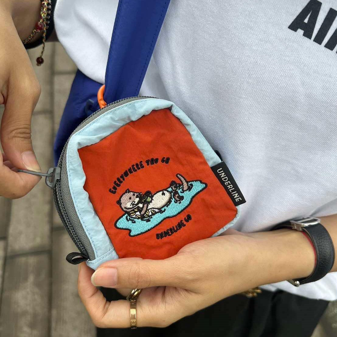 Underline Embroidery Pocket Bag